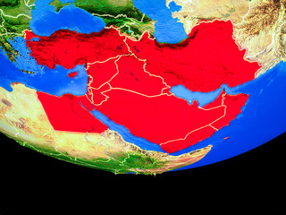 Middle East from space on model of planet Earth with country borders.
