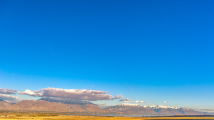 Vibrant sky over mountain and lake in Utah Valley
