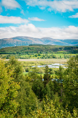 Obraz premium Speyside scottland highlands on a warm light cloudy summer day with beautiful view to the mountain range of great britains roughest country
