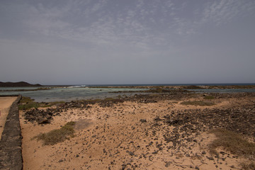 natural landscape of sea rocks and sand