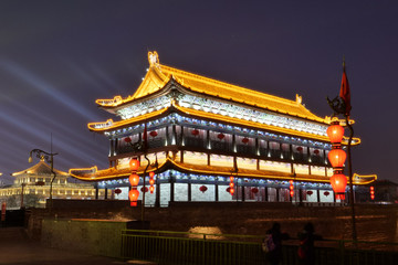 Fototapeta na wymiar Ancient Asian Pagoda style building at night with lighting