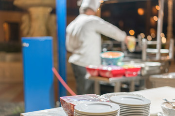 Cook in the kitchen. selected focus