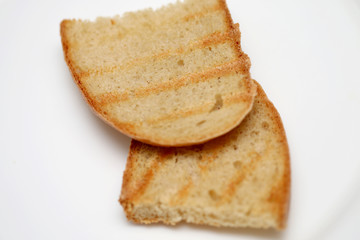Bread of fried croutons on a white background