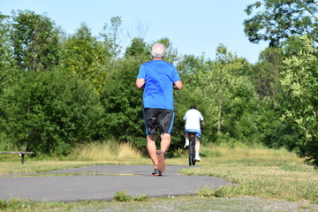 People Exercising In Nature