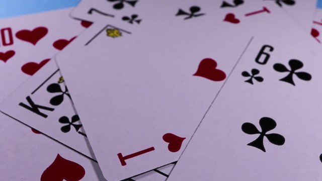 Playing cards. Poker card rotating pattern macro texture background backdrop footage video.