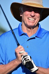 Athletic Male Golfer Smiling With Golf Club Golfing