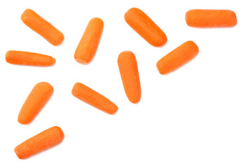 group of organic small baby carrots isolated on a white background. Top view