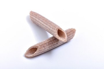 Pasta buckwheat macaroni on white background