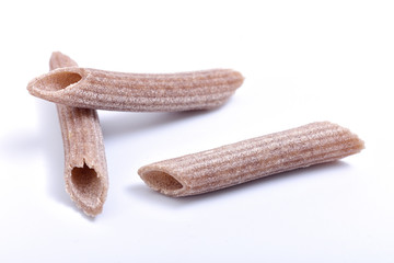 Pasta buckwheat macaroni on white background