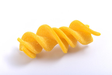 Pasta fusilli on white background
