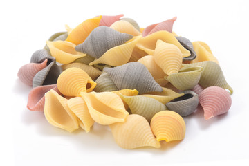 Pasta conchiglie on white background