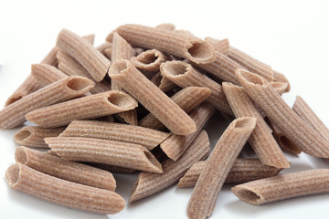 Pasta buckwheat macaroni on white background