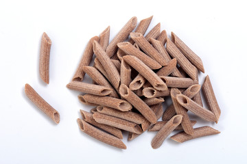 Pasta buckwheat macaroni on white background