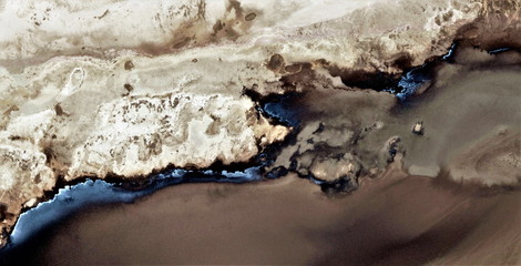 black beach,  black gold, polluted desert sand, abstract photo of the deserts of Africa from the...