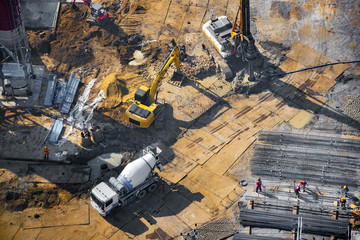 Aerial view of site preparation and construction in progress.