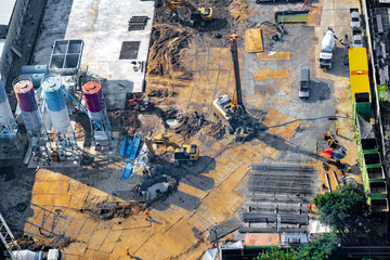 Aerial view of site preparation and construction in progress.