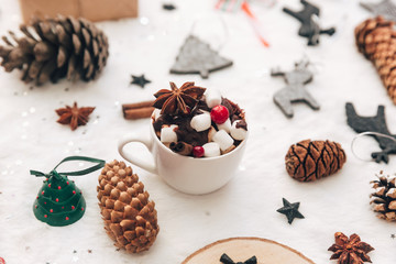 Flat lay hot cocoa with marshmallow. Winter christmas drink on white background