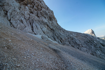 mountain path high in mountains with some snow