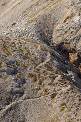 zigzag mountain path with some grass
