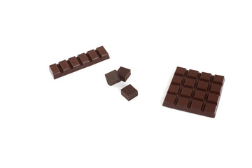 Set with different kinds of chocolate on white background.