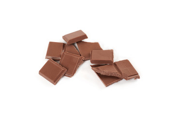 pieces of milk chocolate bar isolated on white background.