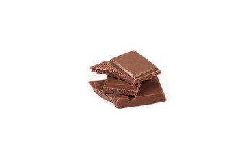 pieces of milk chocolate bar isolated on white background.