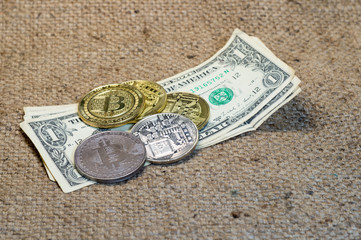 Coin bitcoin on the banknote dollar