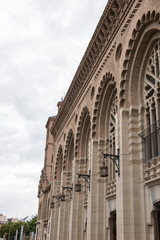 Exterior of an medieval structured building in Brussels. The  architecture looks beautiful with a sense of medieval styled design. Large windows are seen closed.