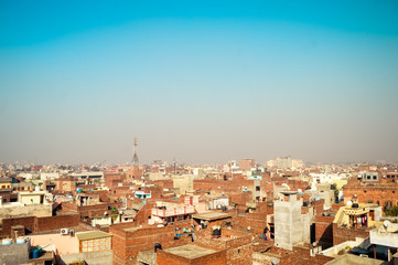 Amritsar, India. Downtown cityscape with top view on skyscrapers Image at sunset.