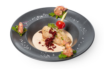 fish fillet with sauce baked and decorated