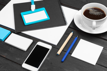 Blank corporate stationery set on wood table background. Branding mock up.