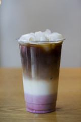 iced cherry latte in plastic cup