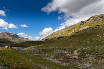 Fototapeta na wymiar The mountains and the lake near Livigno.