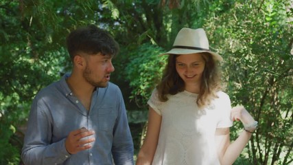 Couple talking while walking