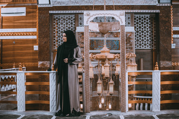 muslim woman praying in mosque