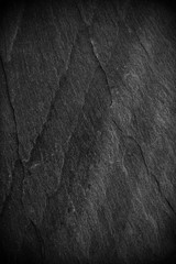 Naklejka premium Dark grey black slate background or texture.