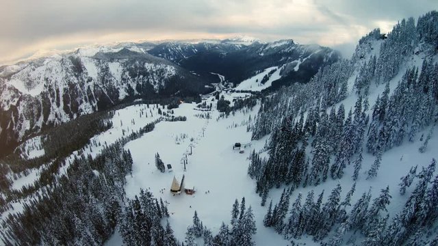 Aerial Pan Up Winter Recreational Sports Destination Mountain Resort