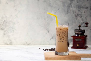 fresh ice coffee cup on the white wooden