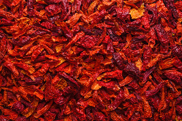 Texture of dried chilli pepper. Wrinkled texture after drying red chili pepper. Spicy seasoning
