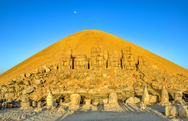Statues around the tomb of Commagene King Antochus I on the top of Mount Nemrut, near Adıyaman,...