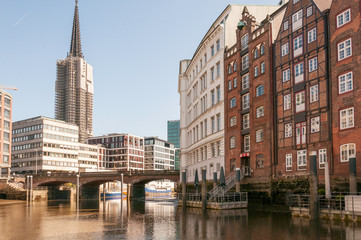 hamburg cityscape; st nicolai church and buildings around the canal