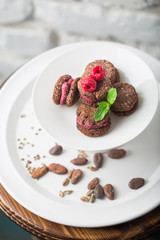 Very tasty vegan macaroons, strawberry macaron on white background almond macaroons, mint macaroons with almond nuts