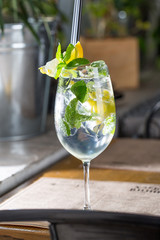 Fresh fruit coctail on the table of restaurant cafe transparent with puffs