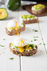 Avocado, cream cheese and poached egg sandwich.