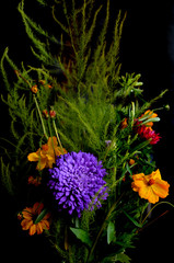 Obraz premium bouquet of flowers on black background