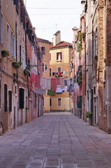 Fototapeta na wymiar Typical street in Venice, Italy