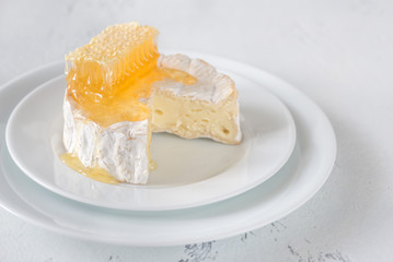 Camembert cheese with honeycombs
