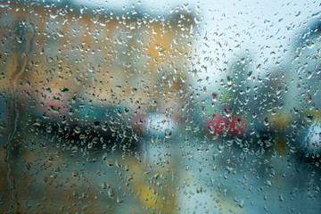 raining on the glass off window. background.