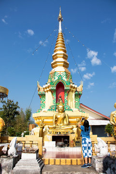 Stupa chedi and buddha statue images in Wat Phrachao Thanchai and Phra That San Kwang temple at Chiangrai city in Chiang Rai, Thailand