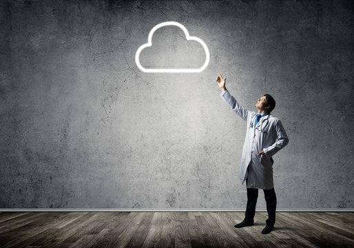 Conceptual image of doctor with cloud symbol